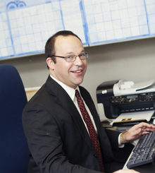Albert Schmidt 220x245 man working at his desktop