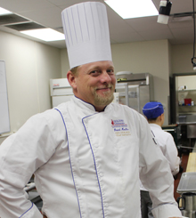 Chef Dave Moeller 220x245 Chef Dave Moeller posing in the kitchen