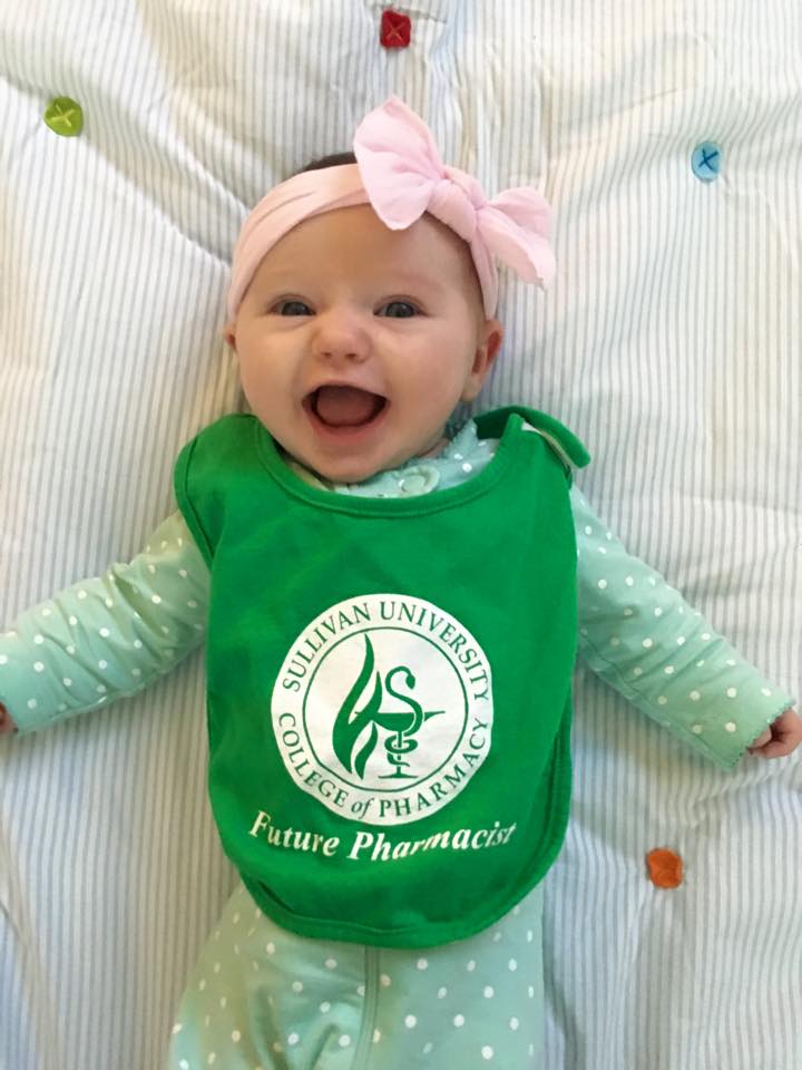 baby wearing a Sullivan University college of pharmacy future pharmacist bib